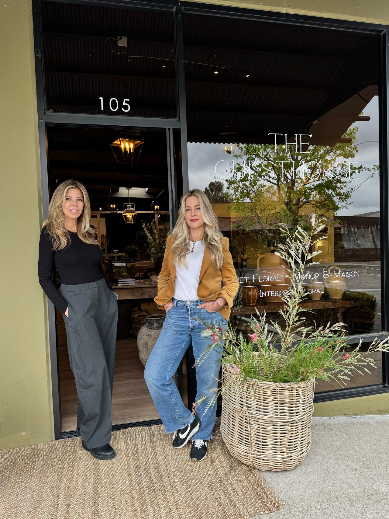 Justine Shapira and Lynn Hall in front of The Guesthouse, from 805 Living